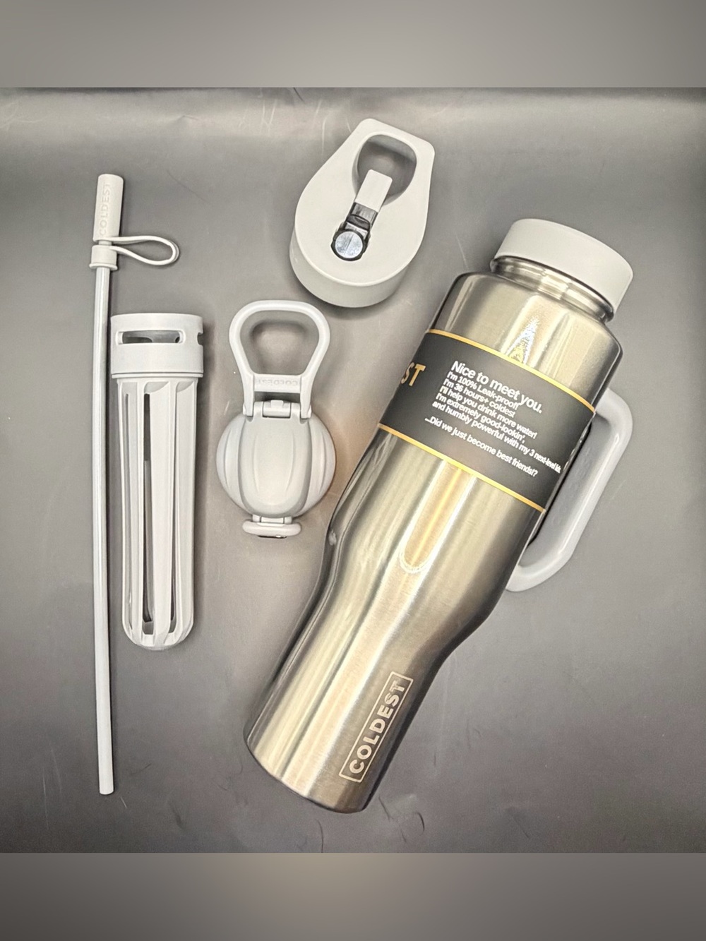Coldest Limitless Polished Steel Travel Bottle with White Accessories 46oz